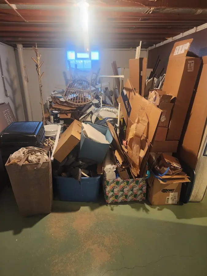 Roll-off dumpster container at job site for 2 Yard Dumpster Rental in Cross Plains